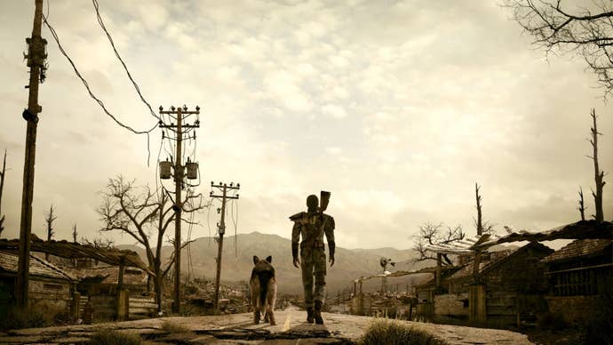 Le protagoniste de Fallout 3 marchant sur une route solitaire.