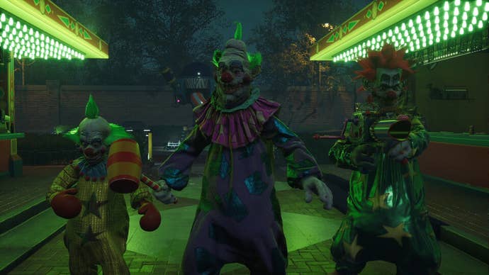 Trois Killer Klowns sont représentés côte à côte dans Killer Klowns from Outer Space The Game.